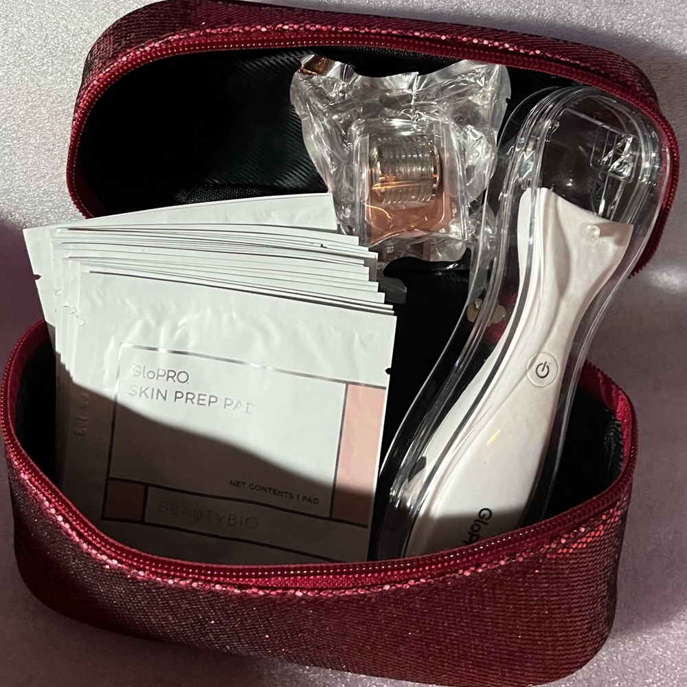 BEAUTY BIO - GloPRO Microneedling Tool & Face Attachment in red sparkle zip bag